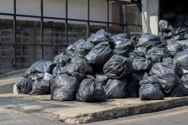 istock Black bags that put garbage inside and tie the bag stack in the garbage collection point. 1194298048