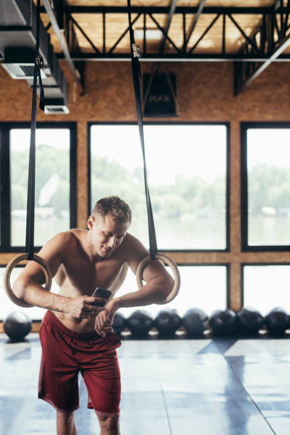 istock Athlete Resting on the Gymnastic Rings 1194299424