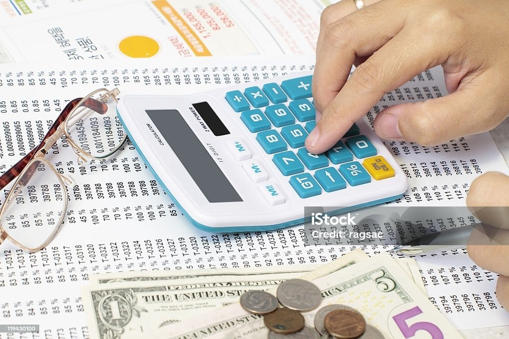 Accountant Checking A Spreadsheet  Balance Stock Photo