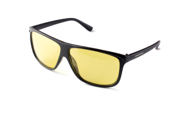 istock black plastic sunglasses with yellow lenses on a white isolated background 1194304597