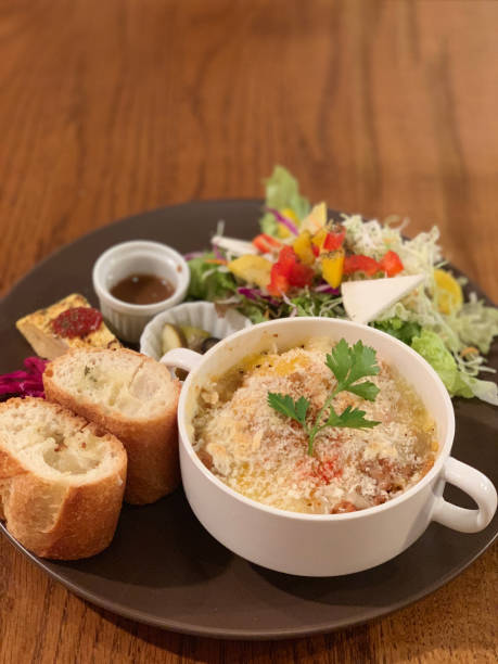 istock Set lunch, toast with gratin and salad. 1194304690