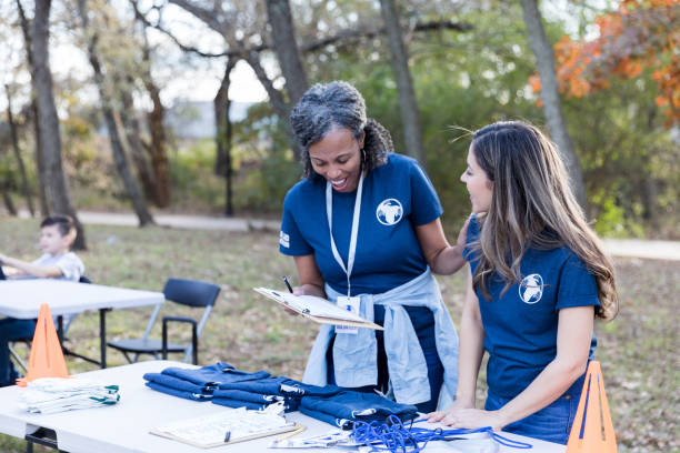 istock Community cleanup committee working at cleanup event 1194308403