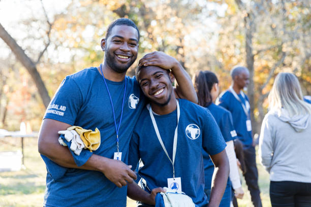 istock Happy father and son volunteering together 1194308426
