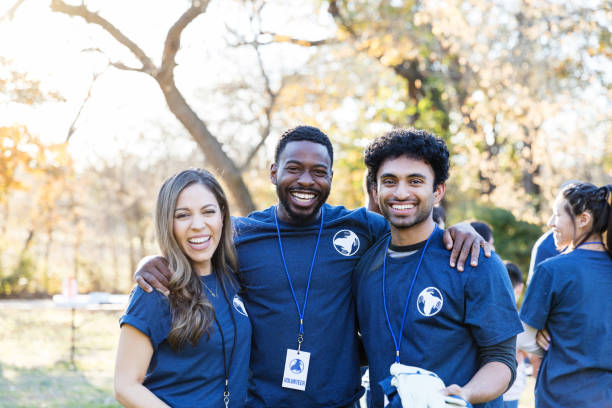 istock Diverse friends enjoy volunteering together 1194308427