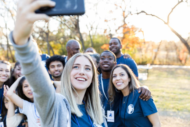 istock Volunteers take selfie after cleanup event 1194308461
