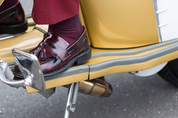 Close up of Mod's shoe on scooter