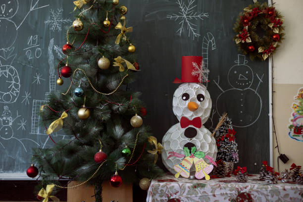 istock School Christmas tree and Snowman 1194313094