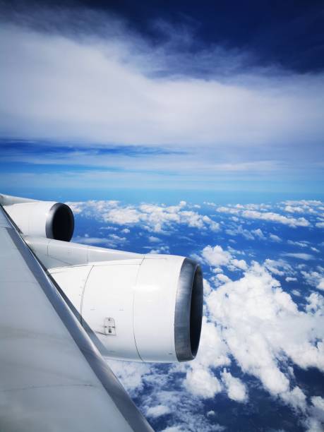 istock The airline planes fly in the sky true the cloud 1194314869