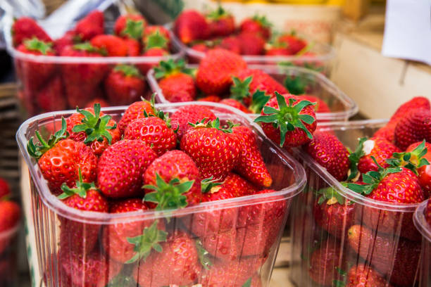 istock Fresh Strawberries At The Market 1194315369