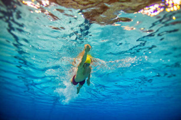 istock Professional athlete at swimming sport training 1194316230