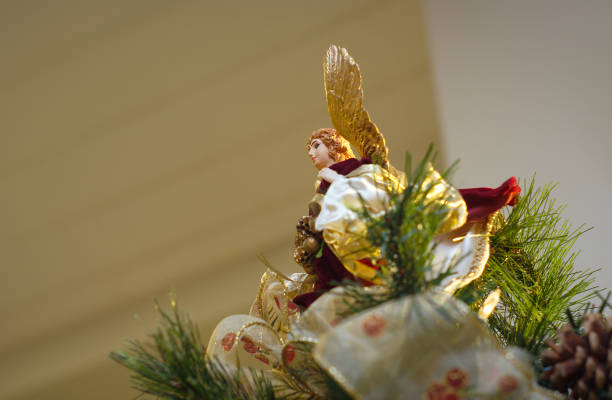 christmas tree angel on top decorations traditional shiny ornaments stock photo