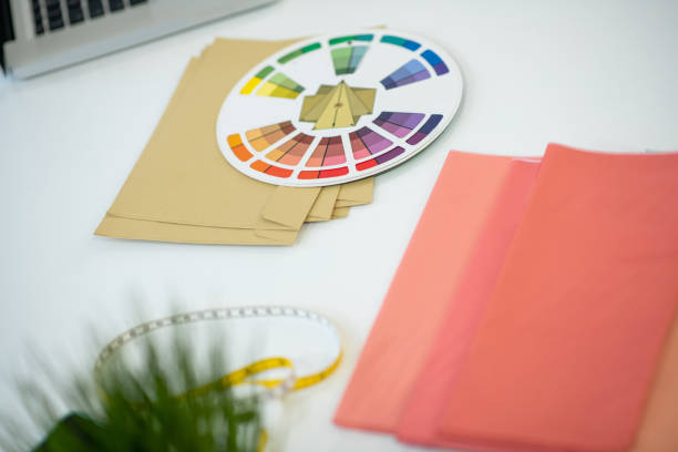 Creative job. Top vie of a colour palette lying on the table of a professional designer