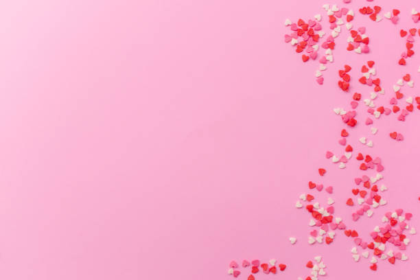 istock pink background with little hearts. flat lay, top view, space for text or object 1194319256