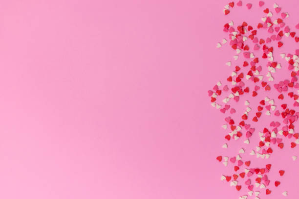 istock pink background with little hearts. flat lay, top view, space for text or object 1194319272