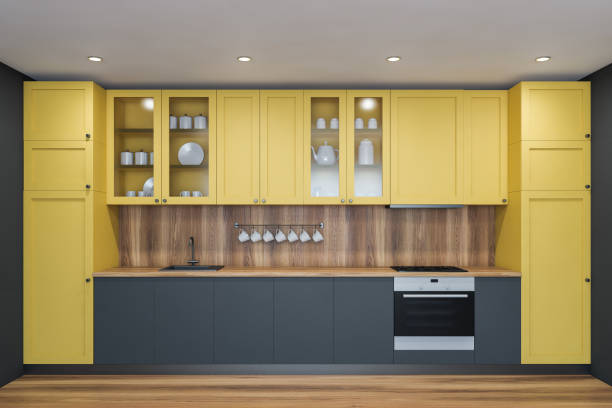 istock Gray and yellow kitchen interior with countertop 1194319984