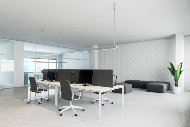 istock White and glass open space office with lounge 1194320913