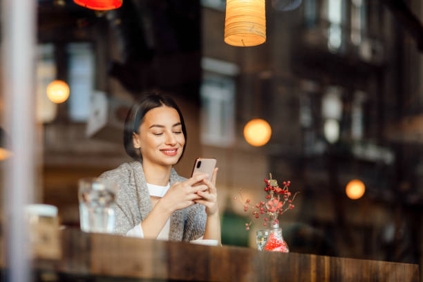 istock One beautiful woman using a phone 1194322131