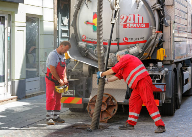 Two Men at Work on the Sewage System in Celje stock photo