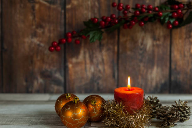 istock Christmas scene with burning candles 1194323523