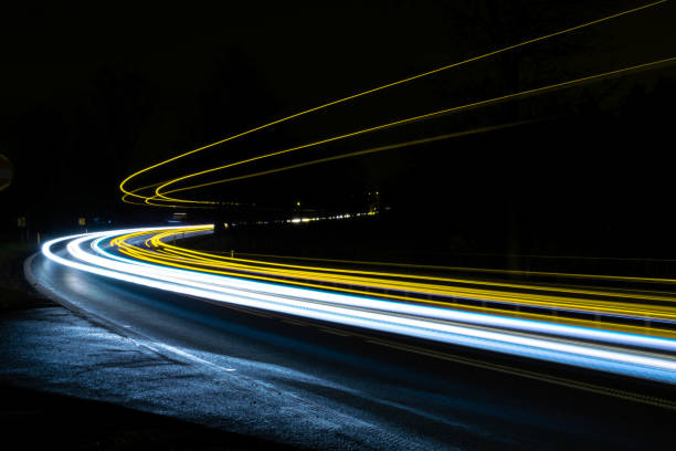 istock car lights at night. long exposure 1194323629