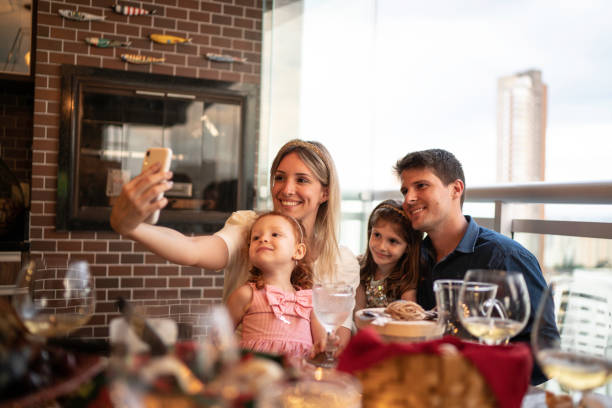 istock Family taking a selfie at home 1194324158