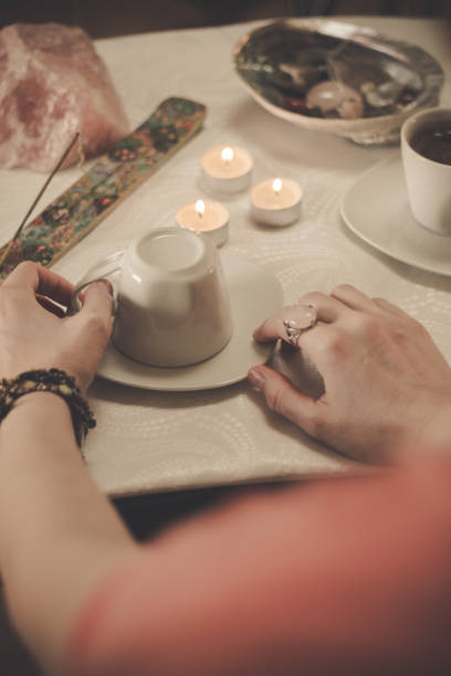 istock Fortune teller with a cup of coffee 1194324991