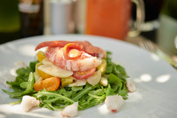 Lobster salad with slices of cheese stock photo