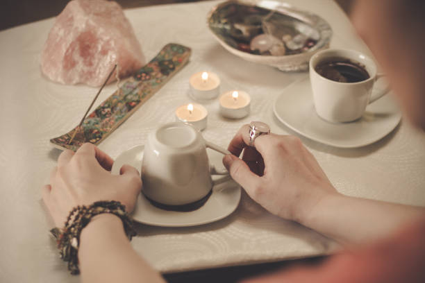 istock Fortune teller with a cup of coffee 1194325040