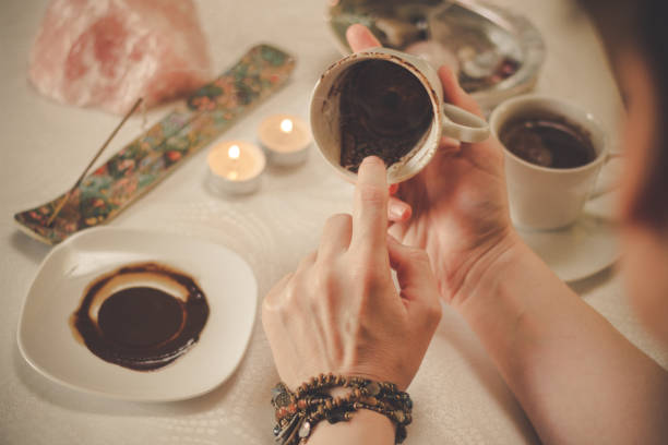 istock Fortune teller with a cup of coffee 1194325086