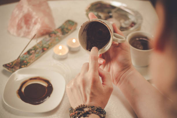 istock Fortune teller with a cup of coffee 1194325119