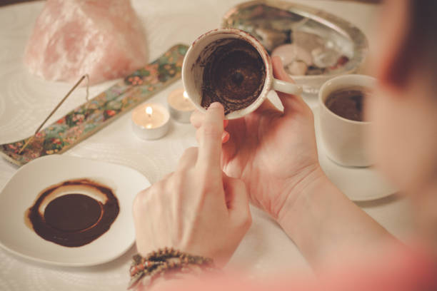 istock Fortune teller with a cup of coffee 1194325247