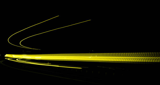 istock car lights at night. long exposure 1194325256