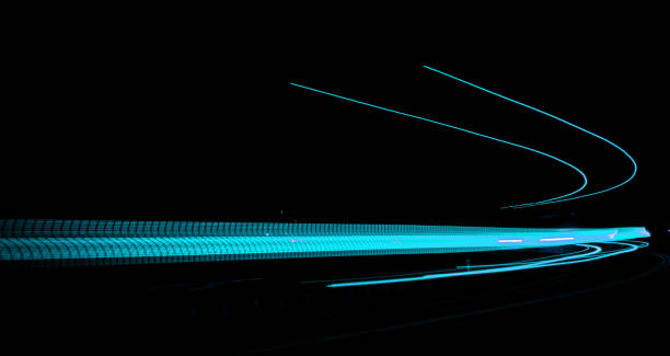 istock car lights at night. long exposure 1194325257