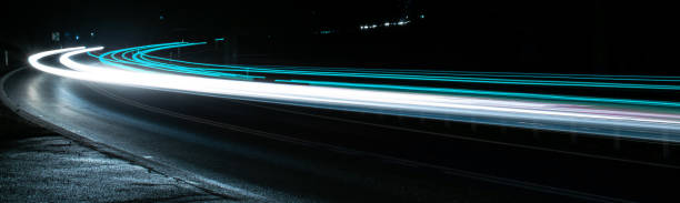 istock car lights at night. long exposure 1194325263
