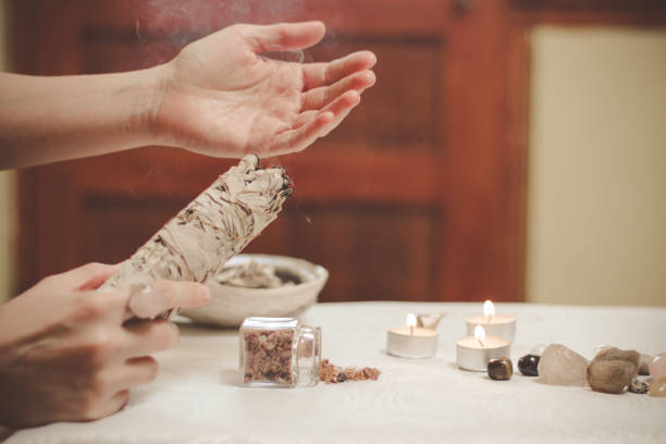 istock Hand holding sage smudge smoking 1194325443