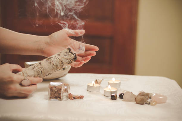 istock Hand holding sage smudge smoking 1194325591