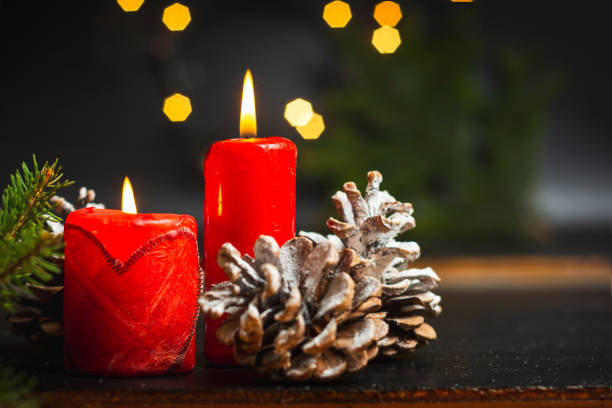 istock Candle burning in festive Christmas environment 1194326374