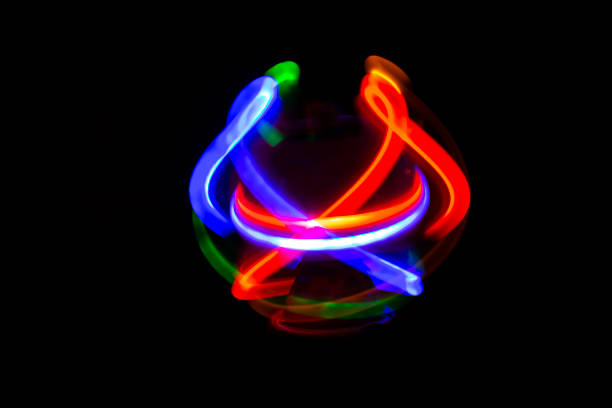 istock Movement of neon light in the dark 1194326395