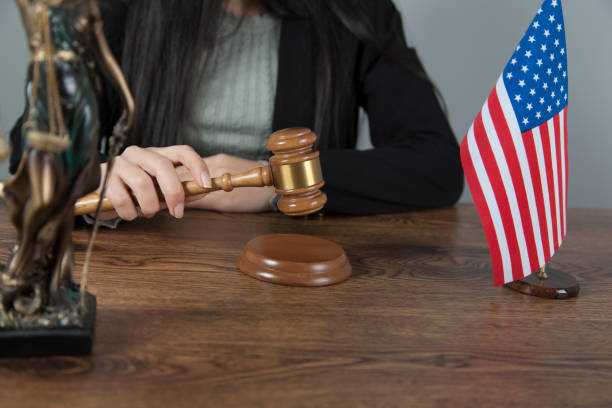 istock woman hand judge on desk 1194329951