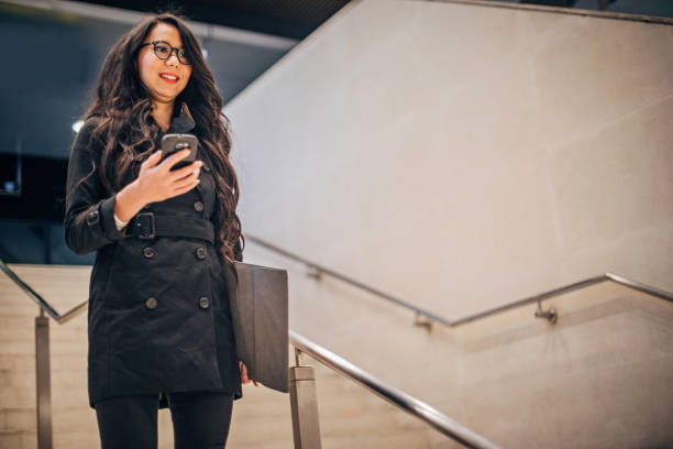 istock Pretty woman is text messaging 1194330019