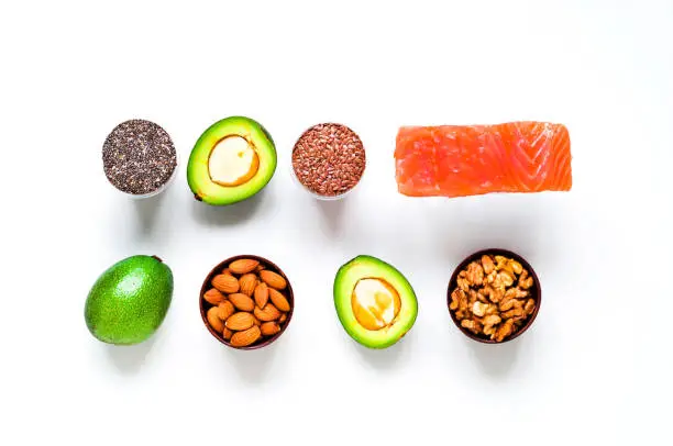 Photo of Plant-Based, Beyond Soy. Ingredients for ketogenic diet on white background. The concept of healthy eating. Close-up