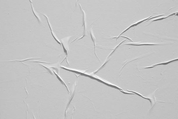 istock White sheet of crumpled paper. 1194332950