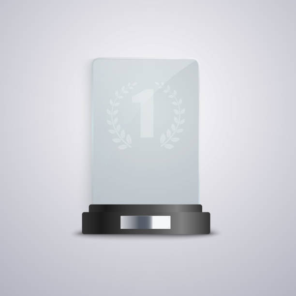 istock Glass trophy mockup with number one written on crystal plaque 1194334047