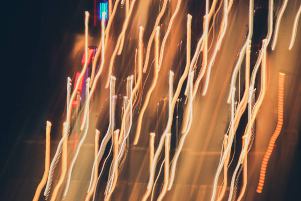 istock Lines light traces background. Lights trails dynamic backdrop. Night exposure motion lines texture. 1194334118