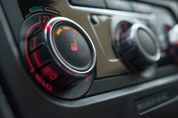 istock Button for heating the car seats close-up. 1194335066