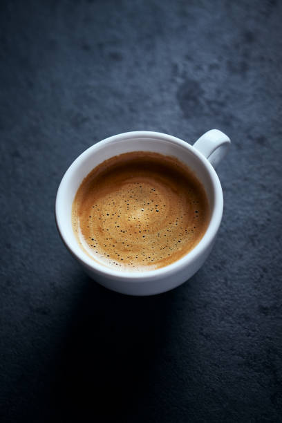 istock Cup of coffee on black background. Copy space. 1194335275