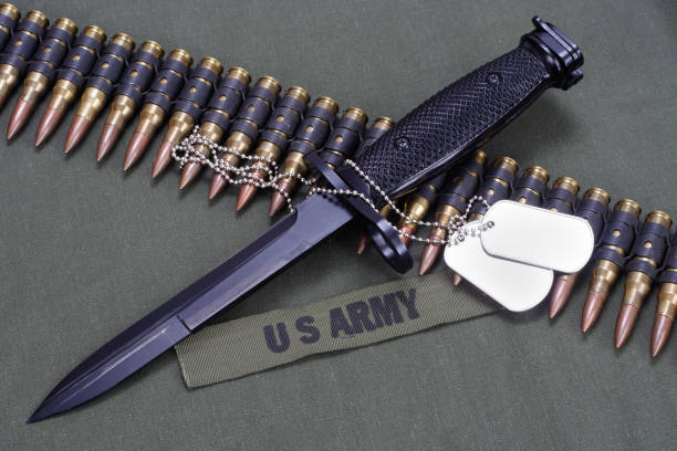 istock bayonet and ammunition belt on US ARMY uniform 1194336344