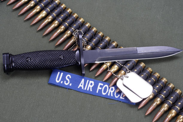 istock bayonet and ammunition belt with dog tags on US AIR FORCE uniform 1194336909