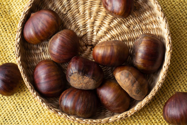istock Fresh edible chestnuts in a basket 1194340183