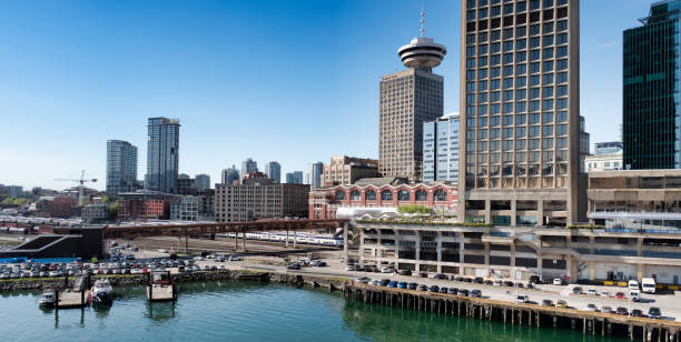 Vancouver Eastside Office Towers Image of eastside Vancouver, British Columbia with seabus terminal in foreground. east vancouver stock pictures, royalty-free photos & images